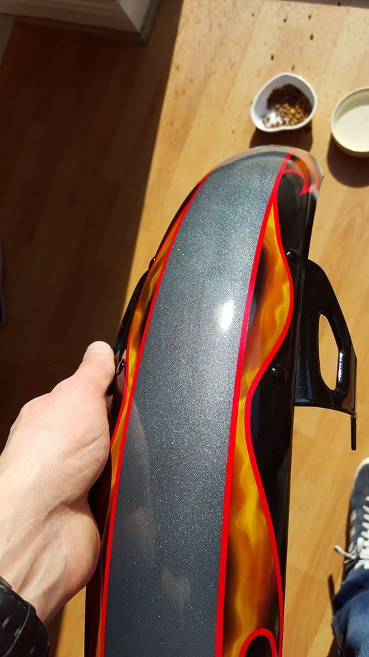 Airbushed Painting of a Harley Davidson with Flame Design on Front Mud guard